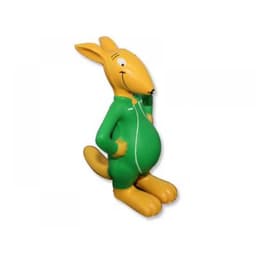 A cartoon kangaroo figurine in green and yellow, smiling and standing with hands on its hips.