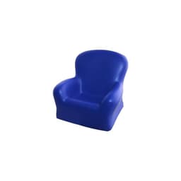 A blue stress chair features a soft, rounded design with armrests and a sturdy base. It has a smooth, glossy finish.