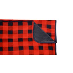 A red and black checked picnic blanket with a contrasting dark edge. It features a soft, plush texture.