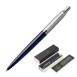 A ballpoint pen in royal blue with a silver clip, presented in a black box with a branding logo.
