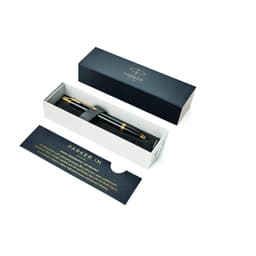 A black ballpoint pen in a white box with gold accents and a card inside. The pen has a sleek, lacquer finish.