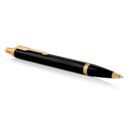 A black ballpoint pen with gold accents and a clip, featuring a sleek lacquer finish.