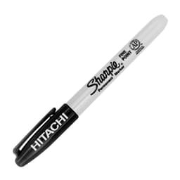 A black and white permanent marker with a fine tip and a branding logo.