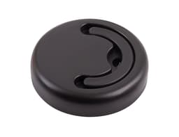 A round black lid with a groove design for easy handling, featuring a logo on the surface.