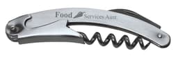 A drink bottle opener and corkscrew in silver metal with an integrated knife, featuring a branding logo.
