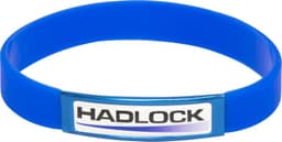 A blue silicon wristband featuring a central branding element. The wristband is flexible and smooth in texture.