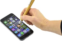 A bamboo and silver pen held above a smartphone screen displaying various app icons. The pen has a sleek design.