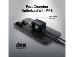 A compact black wall charger with a USB-C cable attached, featuring a small LED indicator and a logo.