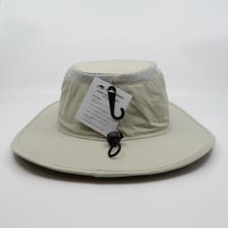 A beige sun hat with a wide brim, featuring a chin strap and a mesh band for ventilation, includes a logo.