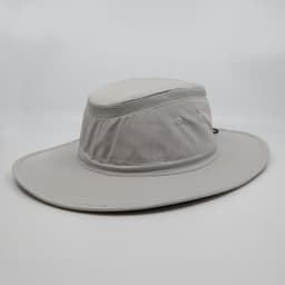 A grey brimmed sun hat with a mesh panel, featuring a logo on the side.