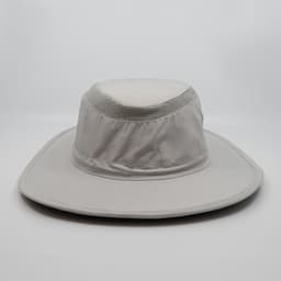 A light grey bucket hat with a wide brim and mesh detailing on the crown, featuring a logo.