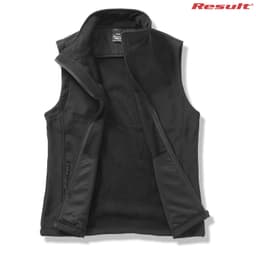 A black ladies' softshell vest with a zip front and internal fleece lining, featuring a logo.