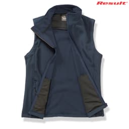 A dark navy softshell vest with an open front and two side pockets, featuring a branding logo.