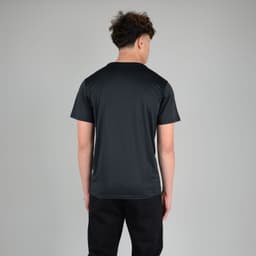 A black adult tech tee featuring a simple design and a logo on the back, worn by a model from behind.