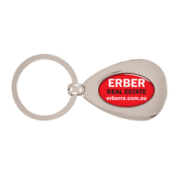 A silver metal keyring with an oval shape and a red logo. It features a keyring attachment for convenience.