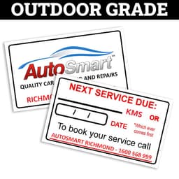 Two outdoor-grade service stickers featuring a logo and fields for service dates and distances, predominantly in white with blue accents.