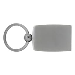 A sleek silver carbon fibre keychain with a round attachment ring and a rectangular body.