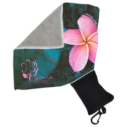 A microfibre towel with a floral design and grey underside, packaged in a black pouch with a logo.