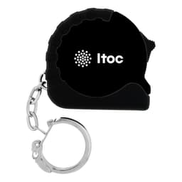 A black mini tape measure with a silver keychain attachment and a logo on the side.