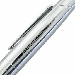 A silver metal pen with a sleek design and clip, featuring a logo on the barrel.