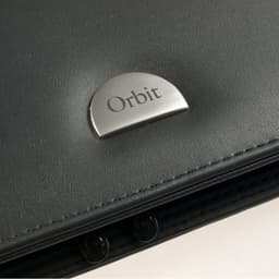 A black document folder with a metallic circular logo. The folder has a sleek, textured design.