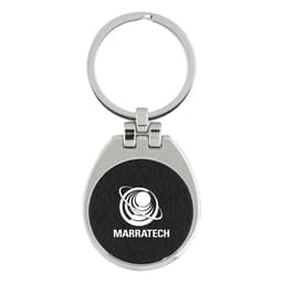 A silver keychain with a black leather-like section featuring a logo. The keychain has a circular ring for keys.