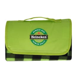 A green picnic blanket with a checkered black and green underside and a logo on the top.