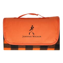 An orange picnic blanket with a checkered design and a logo on the front.