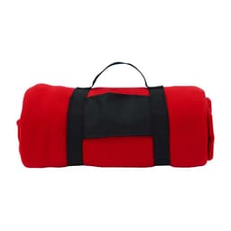 A rolled red blanket secured with black straps, featuring a handle for easy transport.