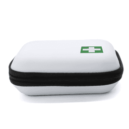 A compact white first aid kit with a green cross logo and a black zipper.