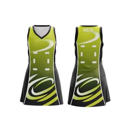 A Women's A-line netball dress in green and black with a graphic design and a logo on the front and back.