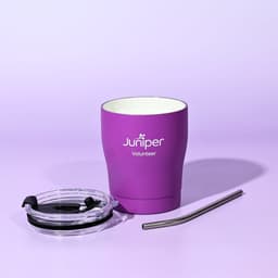 A drink bottle in purple with a clear lid, reusable straw, and a logo on the front.