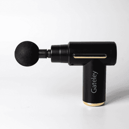 A black massage gun with a rounded attachment, featuring gold accents and a logo on the side.