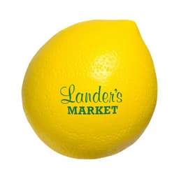 A yellow lemon-shaped stress reliever featuring a logo. The textured surface mimics a real lemon.