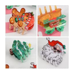 Four festive hair claws in various shapes: a gingerbread man, a reindeer, a Christmas tree, and Santa Claus, featuring vibrant colours.