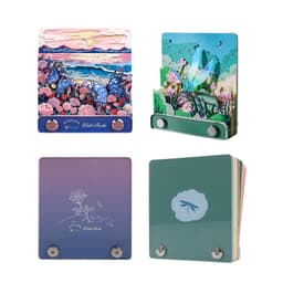 A decorative 3D paper-cut sculpture notepad in various colours featuring floral and butterfly designs. It has a hanging loop.