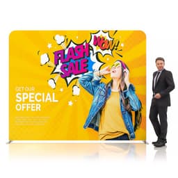 A vibrant, yellow fabric display wall featuring a graphic design with text and a person wearing sunglasses. It has a logo.