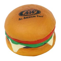 A hamburger-shaped stress reliever in brown, green, red, and white, featuring a logo on the top.