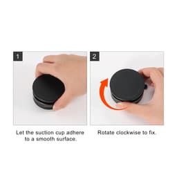 A black suction magnetic phone holder demonstrating a hand attaching it to a smooth surface and rotating to secure.