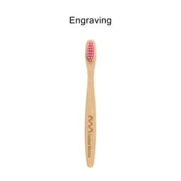 A small bamboo toothbrush with a pink bristle head and a wooden handle featuring a logo engraving.