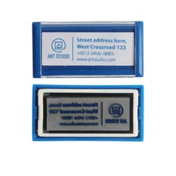 A blue self-inking rubber stamp with a logo, featuring space for an address and contact details.