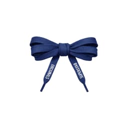 A pair of navy blue custom shoe laces tied in a bow, featuring brand tags on the ends.
