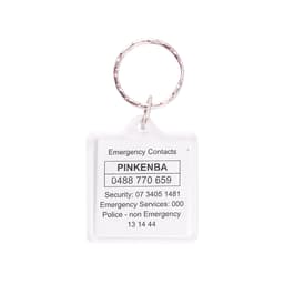 A clear square acrylic keyring with a silver metal ring, displaying emergency contact information.