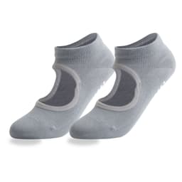 A pair of light grey open top yoga socks featuring a logo and non-slip grip on the sole.