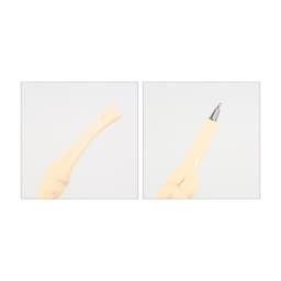 A pen designed to resemble a knee joint, featuring a creamy colour and a silver pen tip.