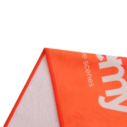 An orange sports towel with a logo and a contrasting white underside, measuring 30x130cm.