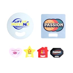 Custom-shaped PP fans in various colours, including round, star, and house shapes, each with a handle cutout and branding.