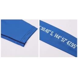 A blue long-sleeved T-shirt made of polyester and spandex, featuring a logo and sunscreen protection.