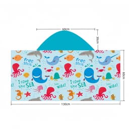 A kids' hooded towel featuring a colourful ocean-themed design with whales, sharks, octopuses, and seashells. It has a blue hood.