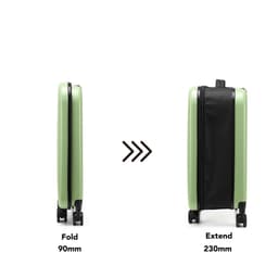 A collapsible suitcase in green, featuring a sleek design with wheels, shown in both folded and extended positions.